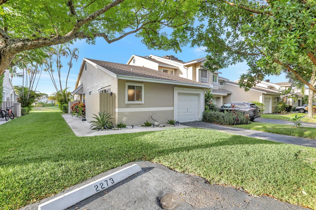 This rarely available lakefront corner villa in the highly desirable community of Discovery Pointe, is perfectly situated between a beautiful lake and a small park, with lots of natural light and spectacular sunset views. This home has been completely remodeled from floor to ceiling, featuring 2 large bedrooms and 2 full baths, 1-car garage, driveway parking, and 1 assigned spot. Interior presents matching tile throughout, vaulted ceilings, skylight, a beautifully designed & renovated open concept kitchen -- including all Samsung appliances that are still under warranty!Community amenities include a pool with jacuzzi, dock, gym, tennis courts, racquetball, a playground, and a clubroom. The community is located a short drive to the beach and near 3 major highways for an easy commute.