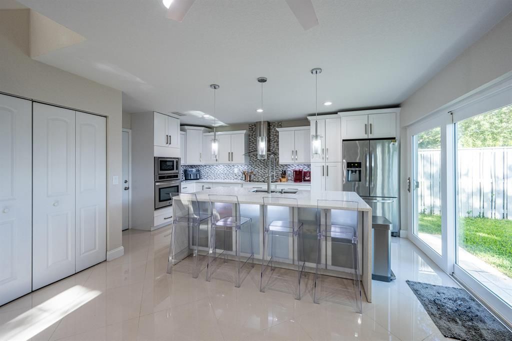 Photo of 32 Governors Court, Palm Beach Gardens, FL 33418 (MLS # R10826402)