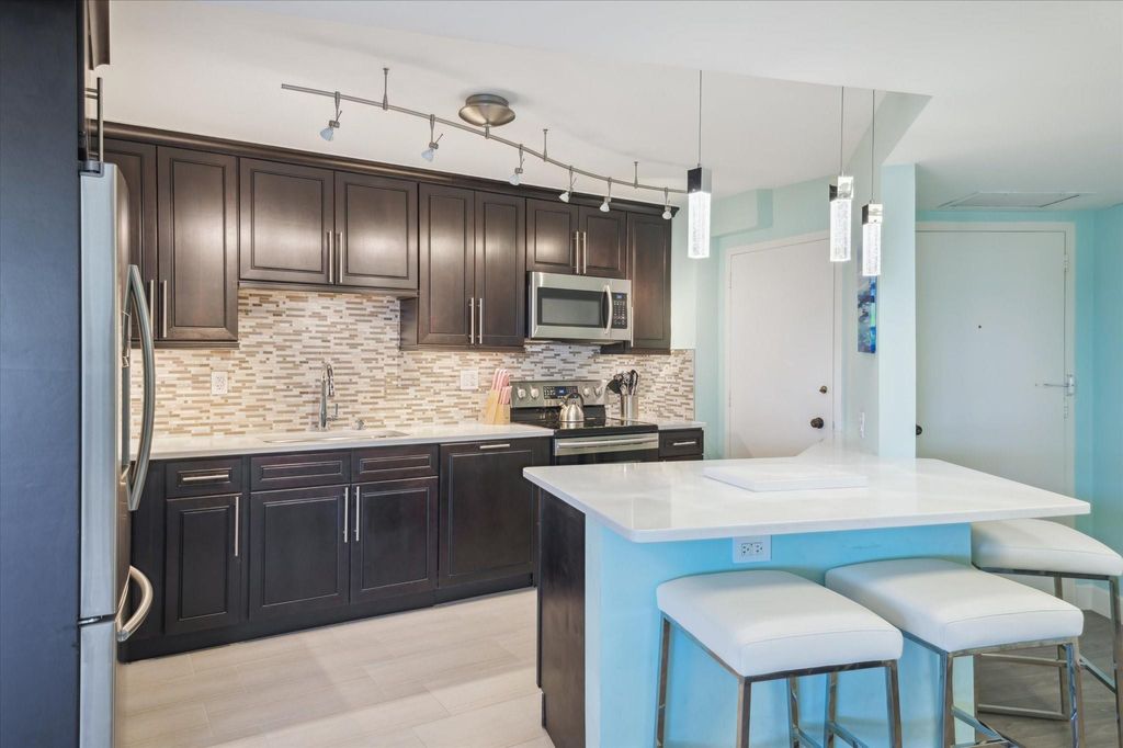 Photo of 3000 Holiday Dr #506, Fort Lauderdale, FL 33316 (MLS # F10536117)