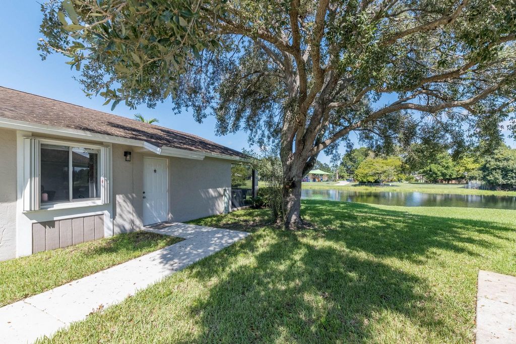 Photo of 518 Woodgate Cir #E, Sunrise, FL 33326 (MLS # F10531611)