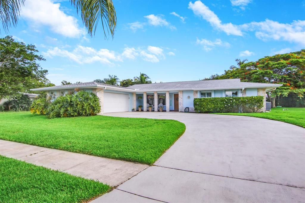 Photo of 1719 SE Adair Road Rd, Port Saint Lucie, FL 34952 (MLS # R10808854)