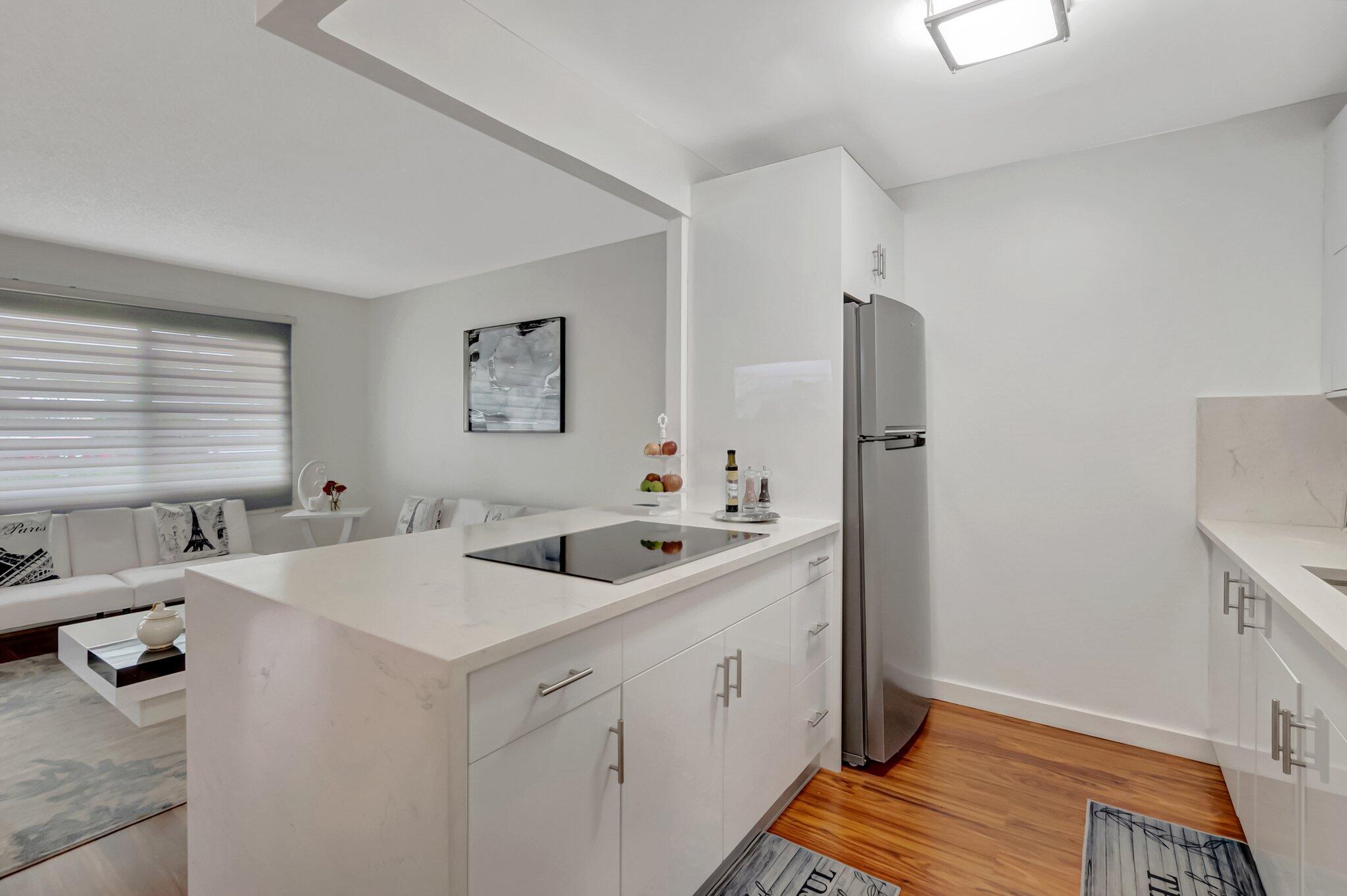 REXFORD AT CENTURY VILLAGE CONDO - Residential