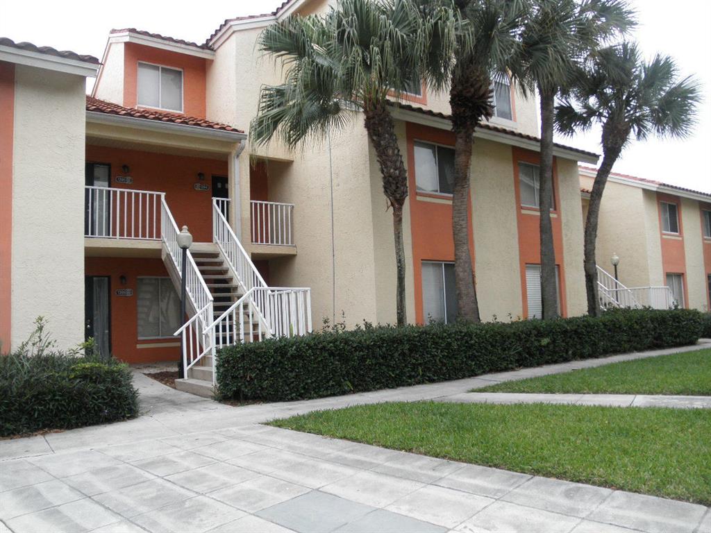 First Floor Unit with over 850 square feet of living area. All tile throughout, breakfast nook, service counter into the dining area, walk in closet, screened patio and water included. LOW MOVE IN ONLY $450 SECURITY DEPOSIT.