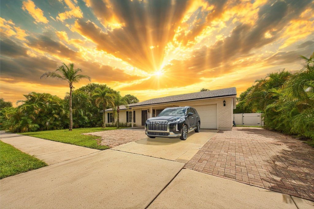 Photo of 708 NW Floresta Drive, Port Saint Lucie, FL 34983 (MLS # R11127908)