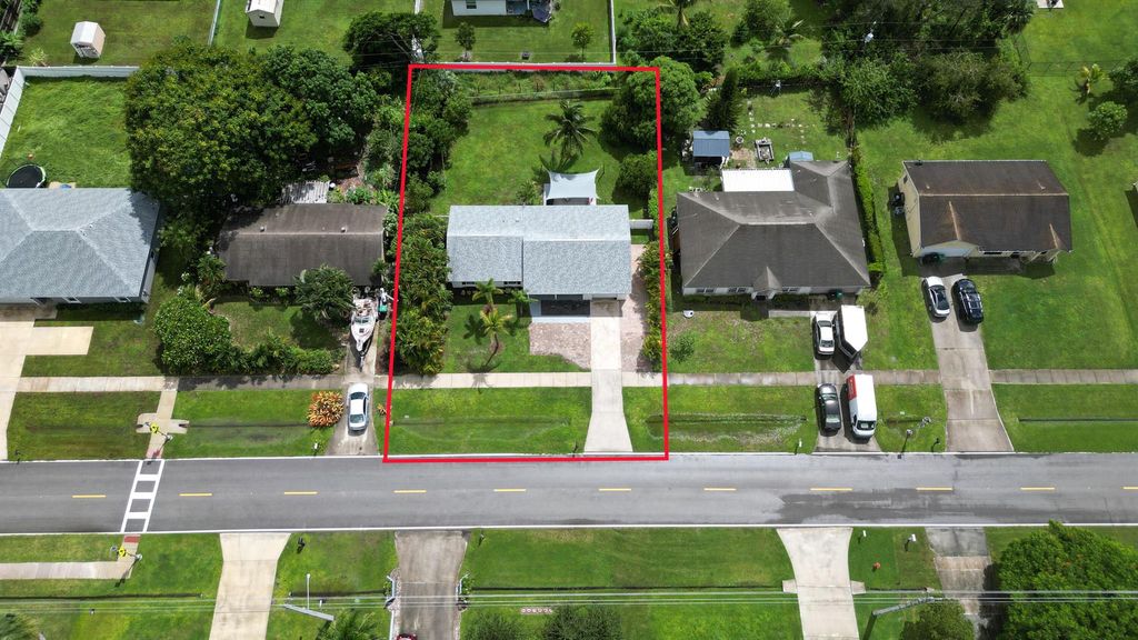 Photo of 708 NW Floresta Drive, Port Saint Lucie, FL 34983 (MLS # R11127908)