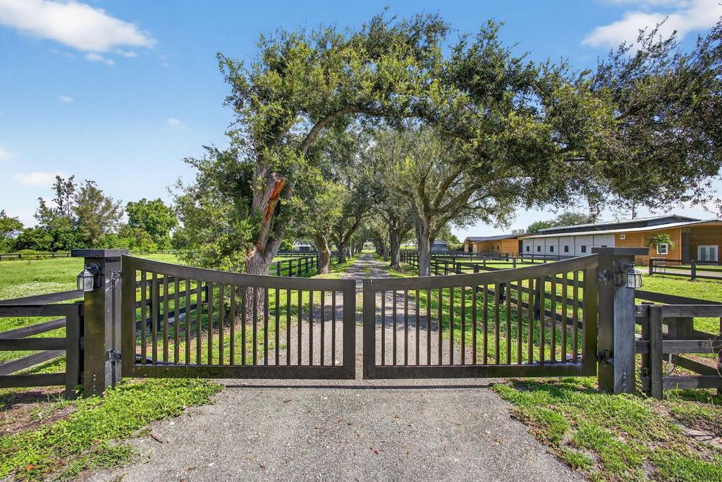 Photo of 16229 Rustic Rd, Wellington, FL 33470 (MLS # R11108944)