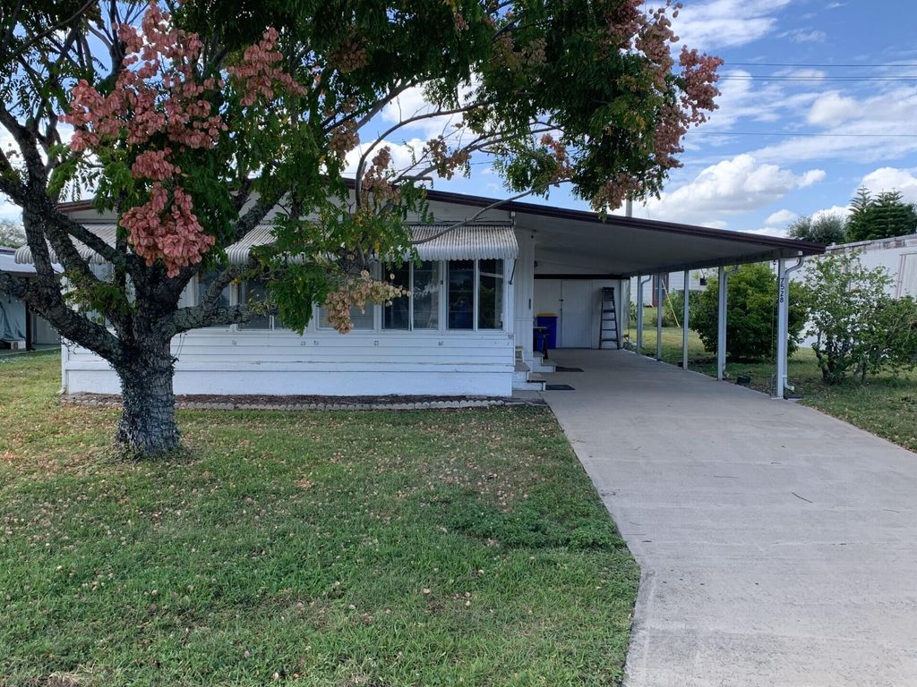 Photo of 7528 SE Swan Avenue, Hobe Sound, FL 33455 (MLS # R10934126)