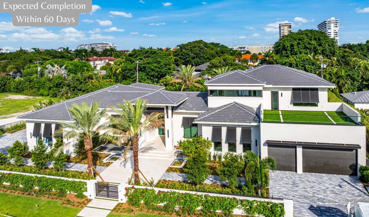 *Expected Completion within 60 days* introducing 1216 Spanish River Road, a prestigious Sea-Side Generational Estate poised to captivate the market with an anticipated completion Early Fall 2024. Nestled within the exclusive Spanish River Land, this Gated Estate occupies the most enviable oversized homesite, spanning an impressive .56 acres of meticulously planned home and grounds. The new home's Coastal Contemporary Design showcases a sophisticated blend of coastally influenced finishes and understated contemporary elegance built by Skymar Custom Homes. The residence boasts a thoughtfully crafted floor plan encompassing more than 11,500 Total SQFT living space, including the 5-car air conditioned garage as well as the expansive covered Loggias and balconies.