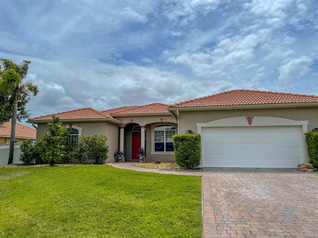 Photo of 5907 NW Bayou Court, Port Saint Lucie, FL 34986 (MLS # R10719617)