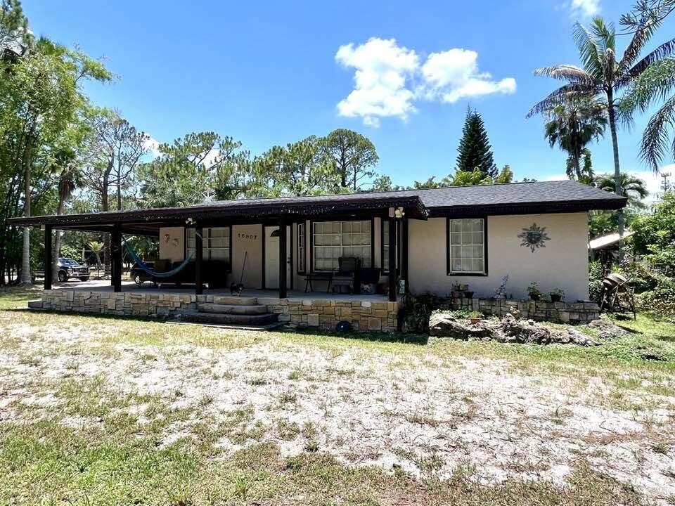 Photo of 16887 W Trafalgar Drive W, The Acreage, FL 33470 (MLS # B26053853)