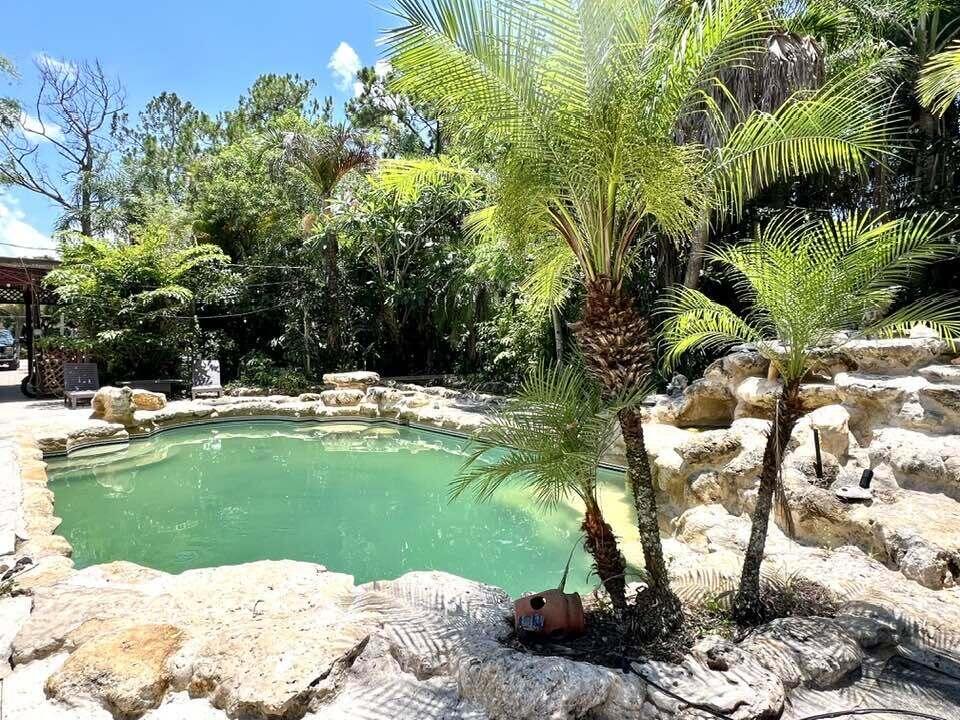 Photo of 16887 W Trafalgar Drive W, The Acreage, FL 33470 (MLS # B26053853)