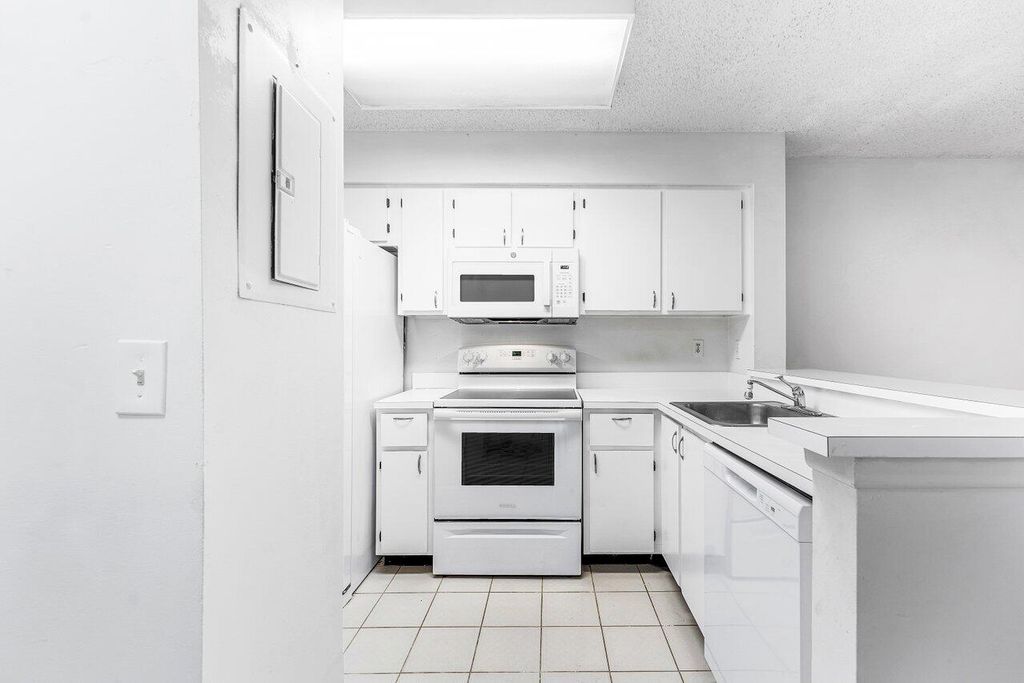 Photo of 2230 N Cypress Bend Drive #209, Pompano Beach, FL 33069 (MLS # R11136122)