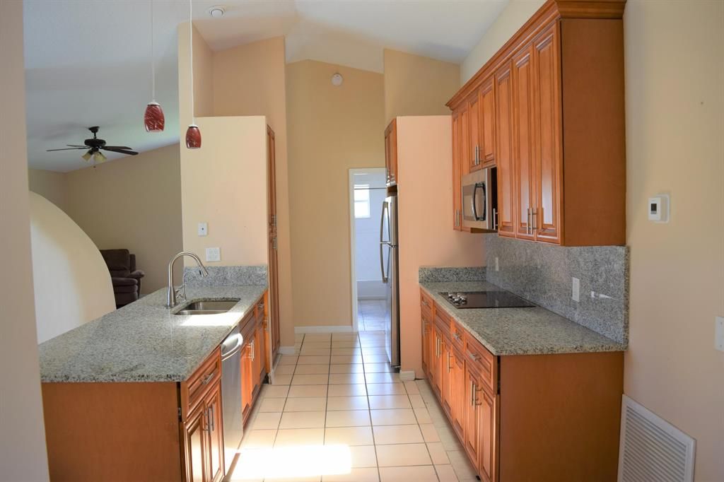 Photo of 3709 SW Haines Street, Port Saint Lucie, FL 34953 (MLS # R10715321)
