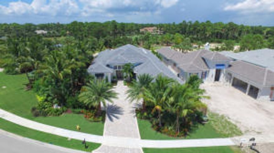 Beautifully appointed builder model, under construction and scheduled to be completed the summer of 2016.  This luxury estate home boasts volume ceilings, marble floors, custom cabinetry, his and hers master baths, golf course view and much more!