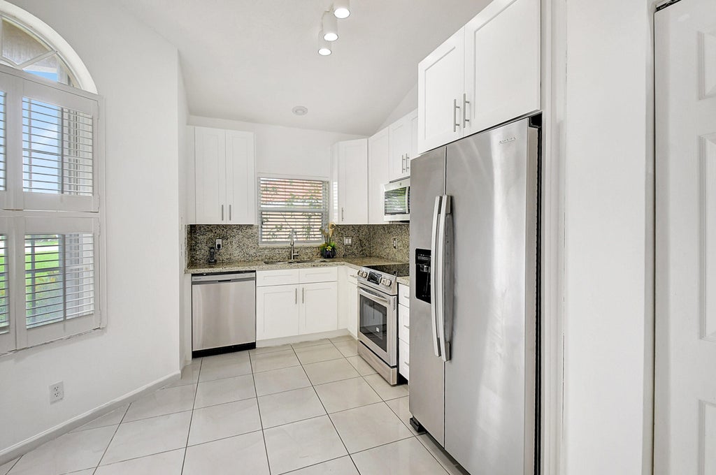 Photo of 6340 Long Key Lane, Boynton Beach, FL 33472 (MLS # R11132366)