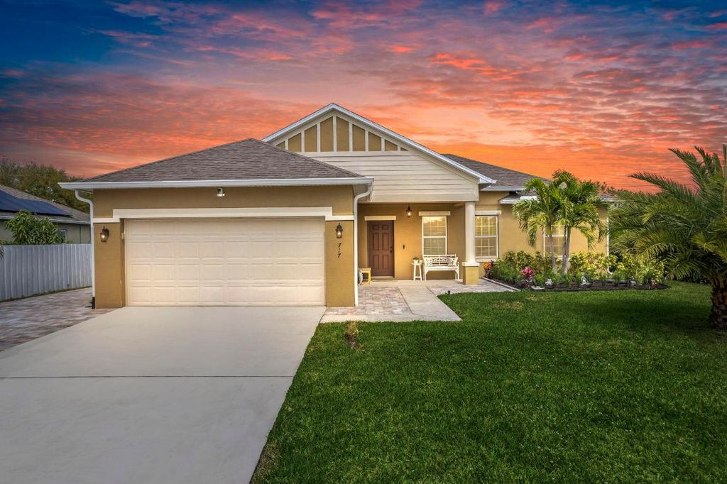 Photo of 717 SW Mccomb Avenue, Port Saint Lucie, FL 34953 (MLS # R11068835)
