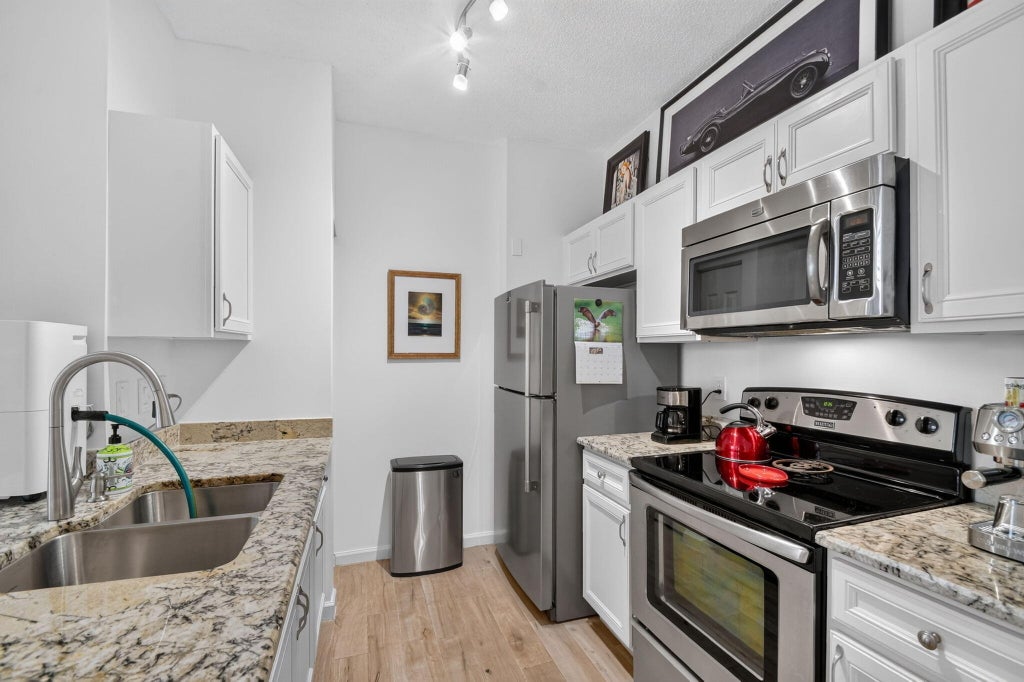 Photo of 720 S SAPODILLA Avenue #101, West Palm Beach, FL 33401 (MLS # B26090805)