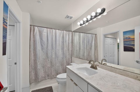 Tiny photo for 720 S SAPODILLA Avenue #101, West Palm Beach, FL 33401 (MLS # B26090805)