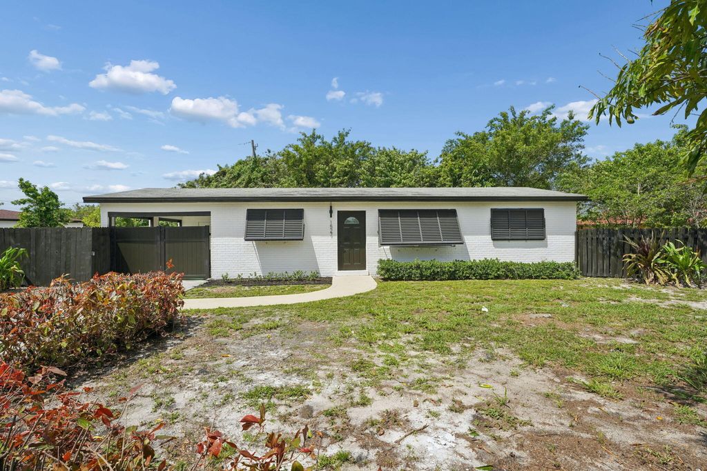 Photo of 1527 Live Oak Drive, West Palm Beach, FL 33415 (MLS # B26018860)