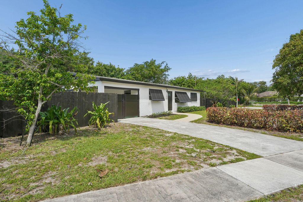 Photo of 1527 Live Oak Drive, West Palm Beach, FL 33415 (MLS # B26018860)