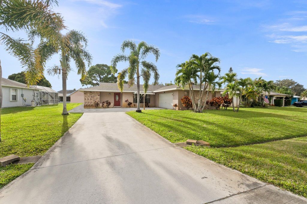 Photo of 2146 SE Dolphin Road, Port Saint Lucie, FL 34952 (MLS # R10958009)