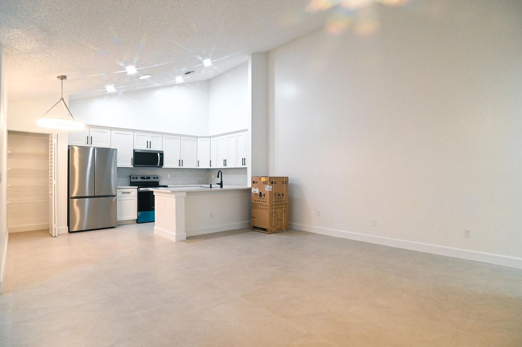 Photo of 1148 Summit Trail Circle #D, West Palm Beach, FL 33415 (MLS # B26011430)