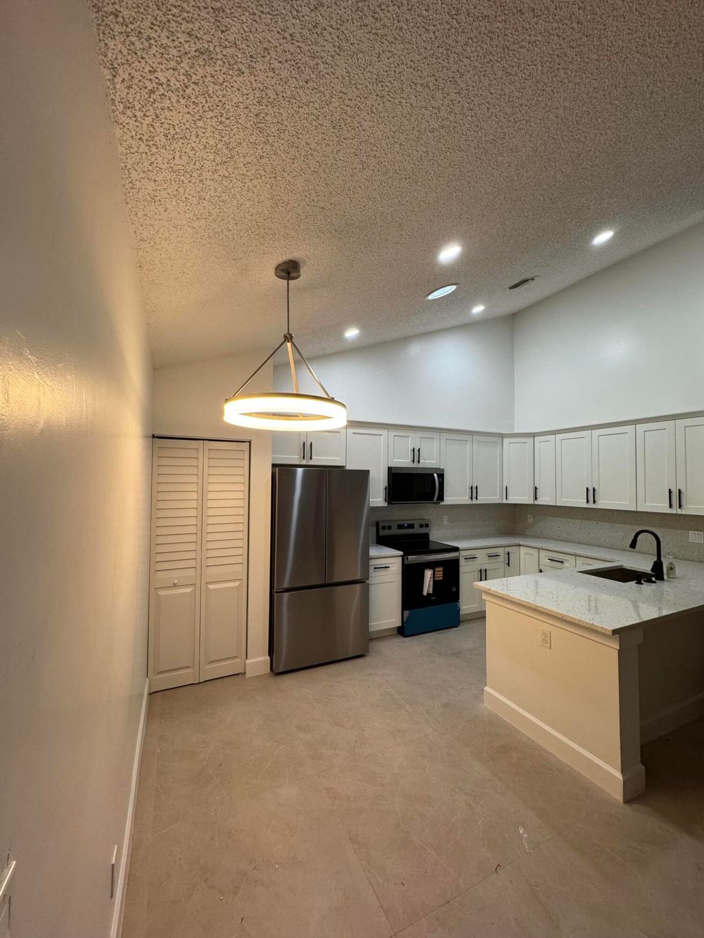 Photo of 1148 Summit Trail Circle #D, West Palm Beach, FL 33415 (MLS # B26011430)