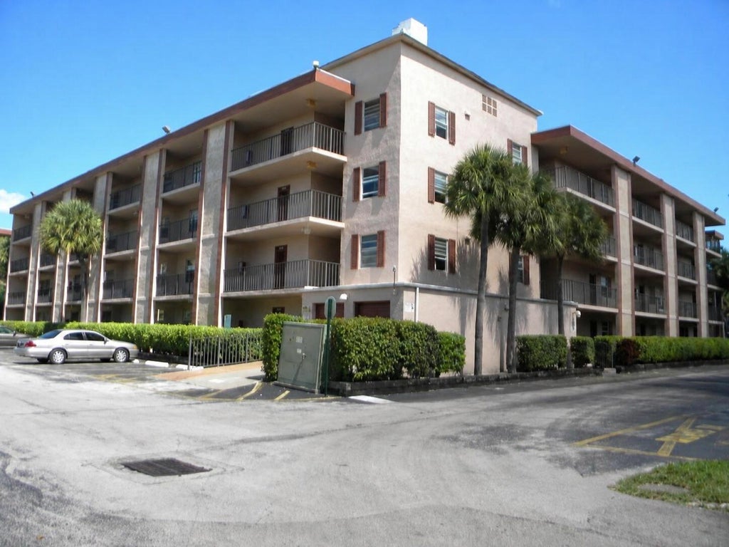 Photo of 3000 NW 48th Terrace, Lauderdale Lakes, FL 33313 (MLS # B26070235)