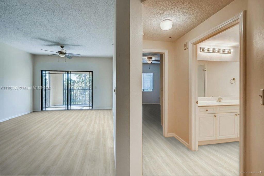 Photo of 3018 Alcazar Place #103, Palm Beach Gardens, FL 33410 (MLS # R11115026)