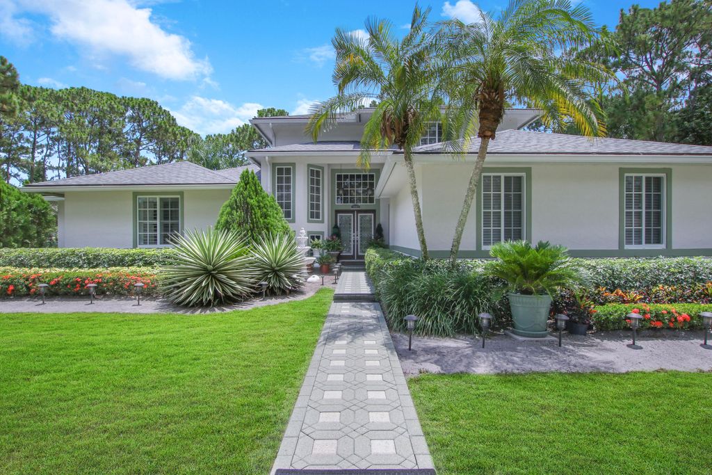 Photo of 7802 155th Place Pl N, Palm Beach Gardens, FL 33418 (MLS # R10804943)