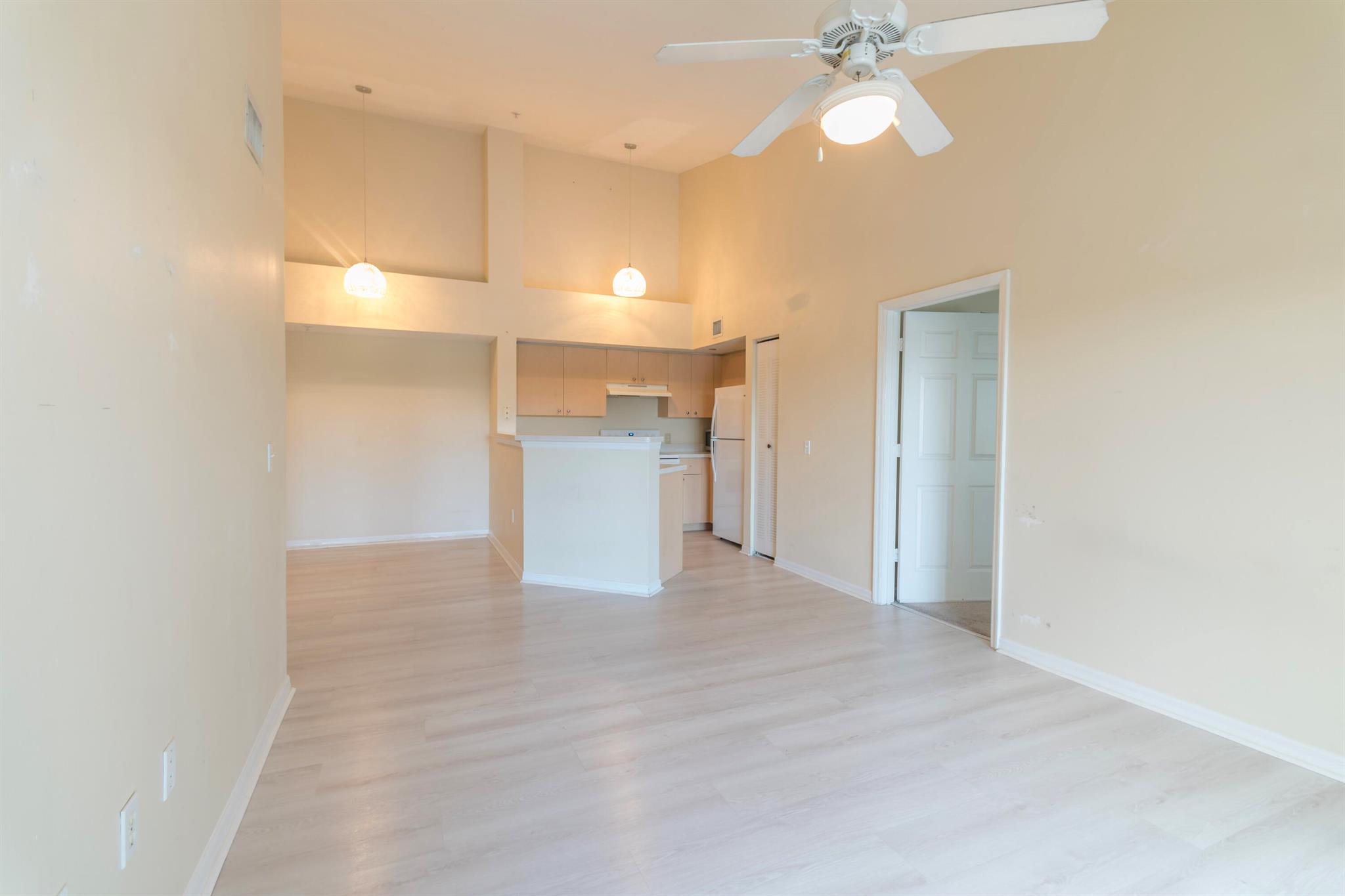 Enjoy breathtaking lake views from this bright and airy 2-bedroom, 2-bath condo in the gated community of Emerald Isle at Laguna Lakes. This top-floor unit features vaulted ceilings, abundant natural light, and an open-concept living area that leads to a private balcony overlooking the water. The split-bedroom layout offers spacious rooms and added privacy. Community amenities include a resort-style pool, fitness center, tennis courts, and clubhouse. Conveniently located just minutes from shopping, dining, I-95, downtown West Palm Beach, the beach, and Palm Beach International Airport.