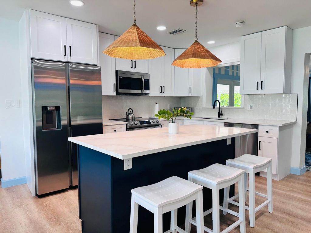 Photo of 330 Azalea Street, Palm Beach Gardens, FL 33410 (MLS # R11080151)