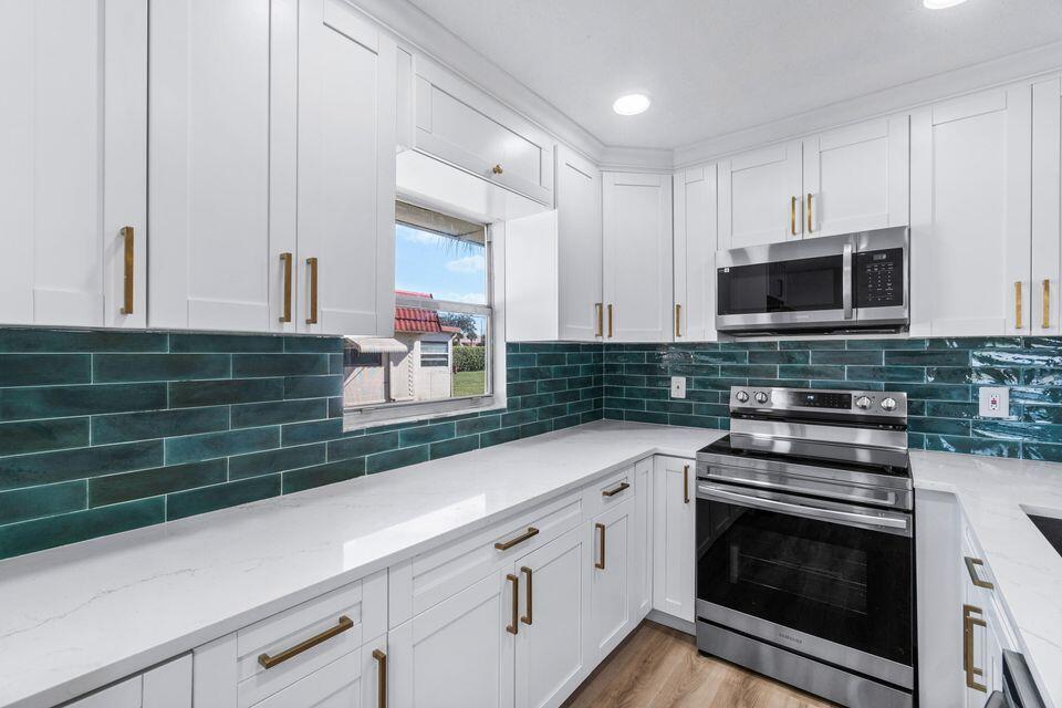 Welcome home to this stunning 2 bedroom, 2 bathroom unit that has been completely renovated from top to bottom! 🌟 Located in an amazing location, this property offers the best of both worlds - convenience and luxury. With every amenity imaginable right at your fingertips, you'll never have to venture far for anything you need. Step inside to discover a beautifully designed interior with a fantastic floor plan that maximizes space and functionality. Whether you're entertaining guests or enjoying a quiet night in, this home has it all.