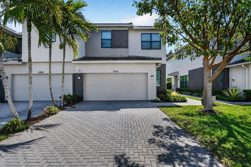 Welcome to this beautifully maintained, just 5-year-new townhome located in the boutique community of Saddlewood. This desirable end-unit offers exceptional privacy and an abundance of natural light, with a modern, open-concept design throughout. Built for both comfort and peace of mind, the home features impact windows and doors. The spacious kitchen is the heart of the home, complete with a large island, perfect for entertaining, and flows seamlessly into the living and dining areas, all enhanced by luxury wood like tile in living areas.  Upstairs, a versatile loft provides the ideal space for a home office, media room, or play area. Downstairs, you'll find an oversized under-stair storage area currently utilized as a small office—maximizing functionality in every corner.  Step outside to your fenced-in back patio with pavers, offering a private outdoor retreat perfect for relaxing or hosting guests. This home truly combines style, function, and privacy in one of the area's most charming communities—don't miss this opportunity!