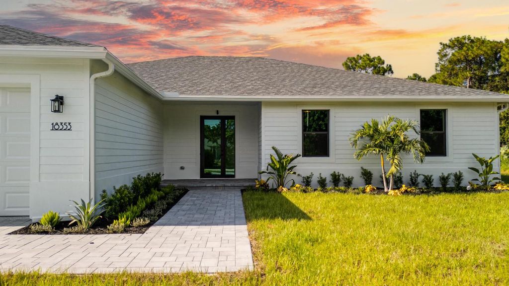 Photo of 1142 SW Abbey Avenue, Port Saint Lucie, FL 34953 (MLS # R11127954)