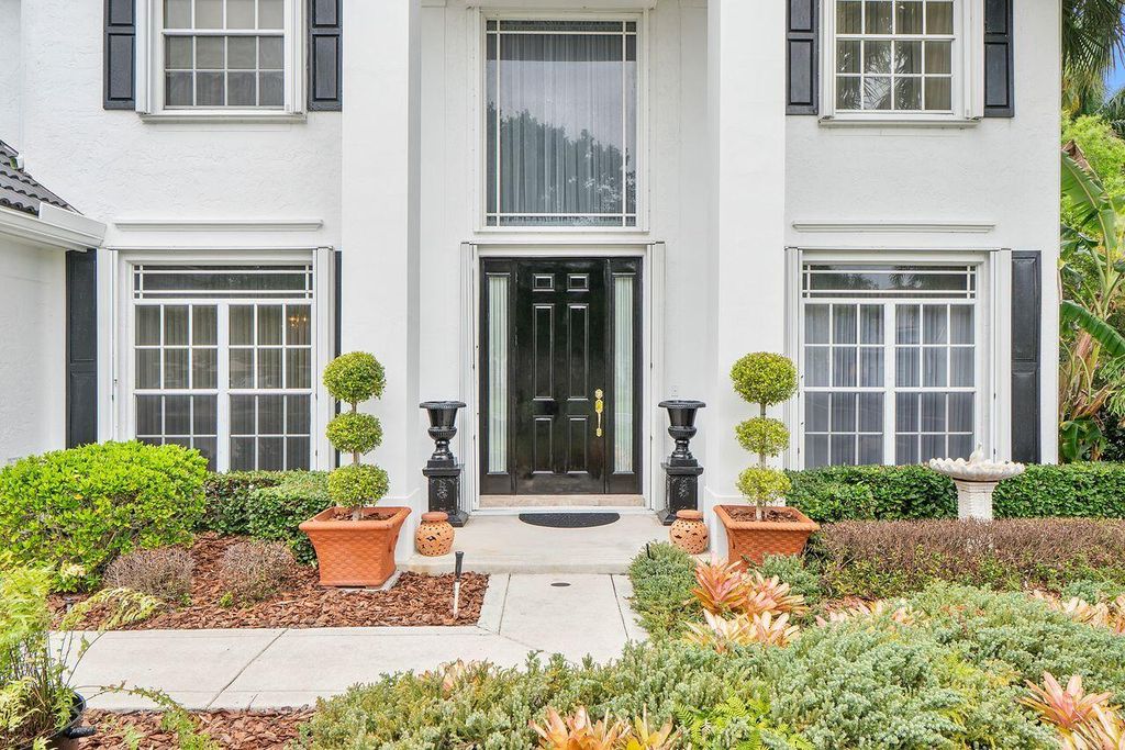 Photo of 152 Oakwood Lane, Palm Beach Gardens, FL 33410 (MLS # B26005818)