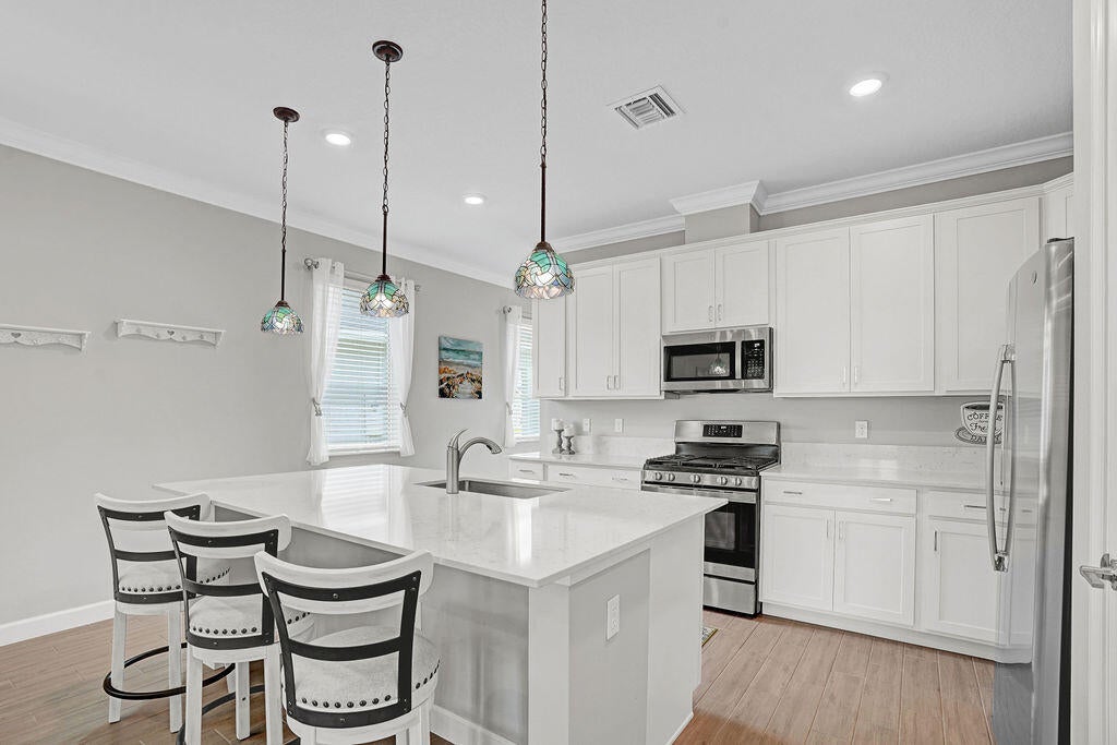 Photo of 745 SE Bloomfield Road, Port Saint Lucie, FL 34984 (MLS # R11132957)