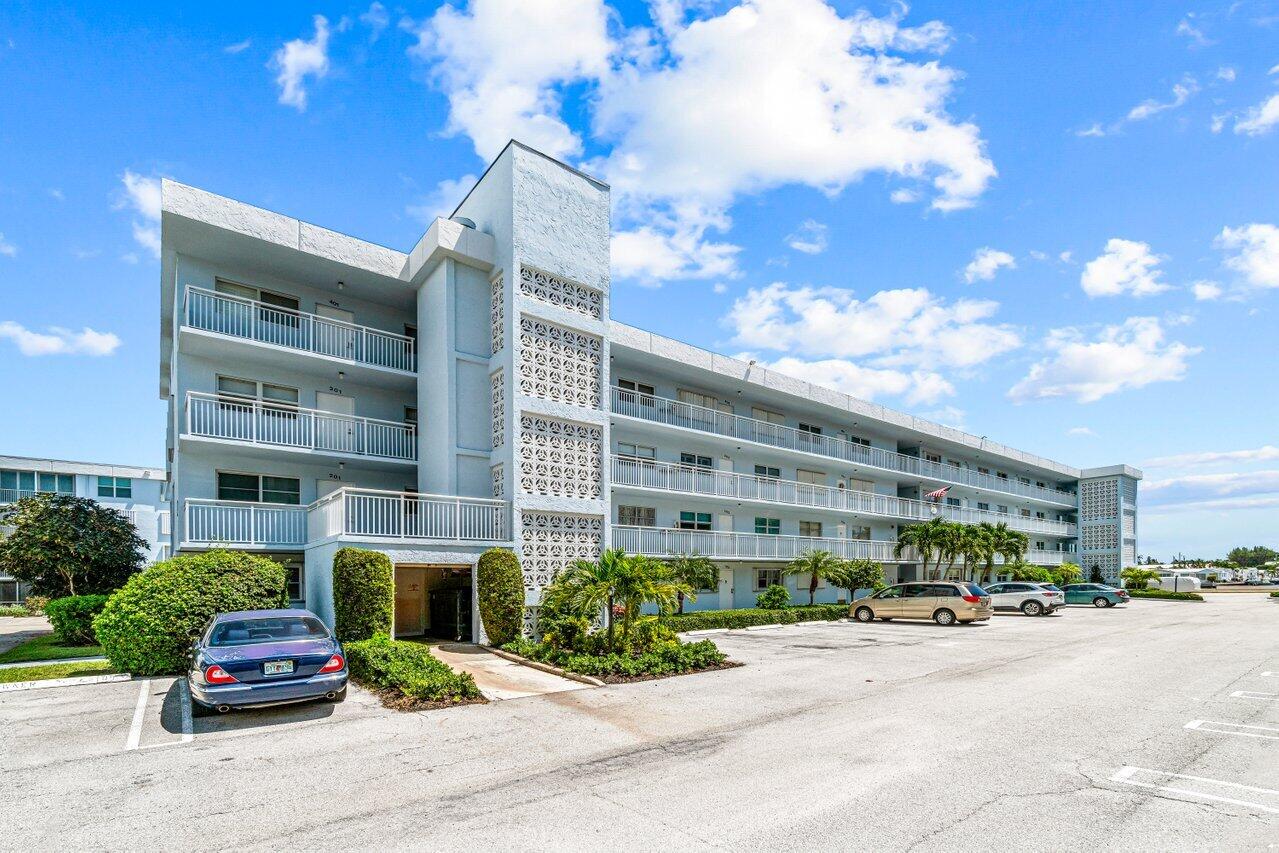 Waterfront Living with Intracoastal Views! Soak in stunning views of the Intracoastal Waterway from this highly sought-after fourth-floor condo. Watch boats glide by and enjoy refreshing, year-round breezes from your private, screened/windowed lanai. The beautifully renovated kitchen (2020) features soft-close cabinetry, a spacious granite-topped island, recessed lighting, and a sleek stainless steel LG appliance suite. The A/C was also replaced in 2020. The vibrant Seagate community features resort-style amenities including an updated clubhouse, two pools, bocce ball, yoga, a putting green, shuffleboard, BBQ/picnic area, and a full calendar of social events. Ideally situated just minutes from shopping, dining, and the pristine Atlantic beaches--this is Florida living at its best!
