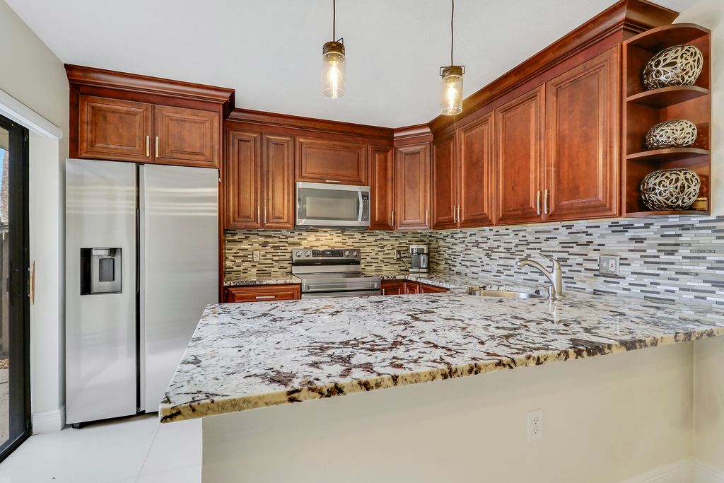 Photo of 2404 24th Way, West Palm Beach, FL 33407 (MLS # R11153725)