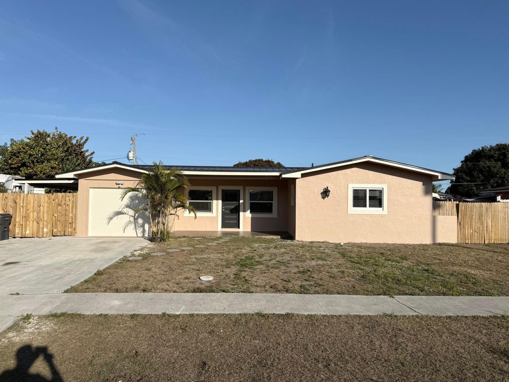 Photo of 2550 Lakehaven Road, West Palm Beach, FL 33415 (MLS # R11163247)