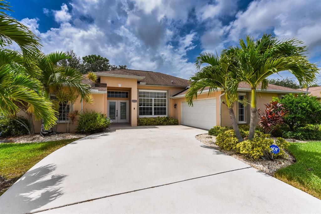 Photo of 6034 NW Wolverine Road, Port Saint Lucie, FL 34986 (MLS # R10741395)