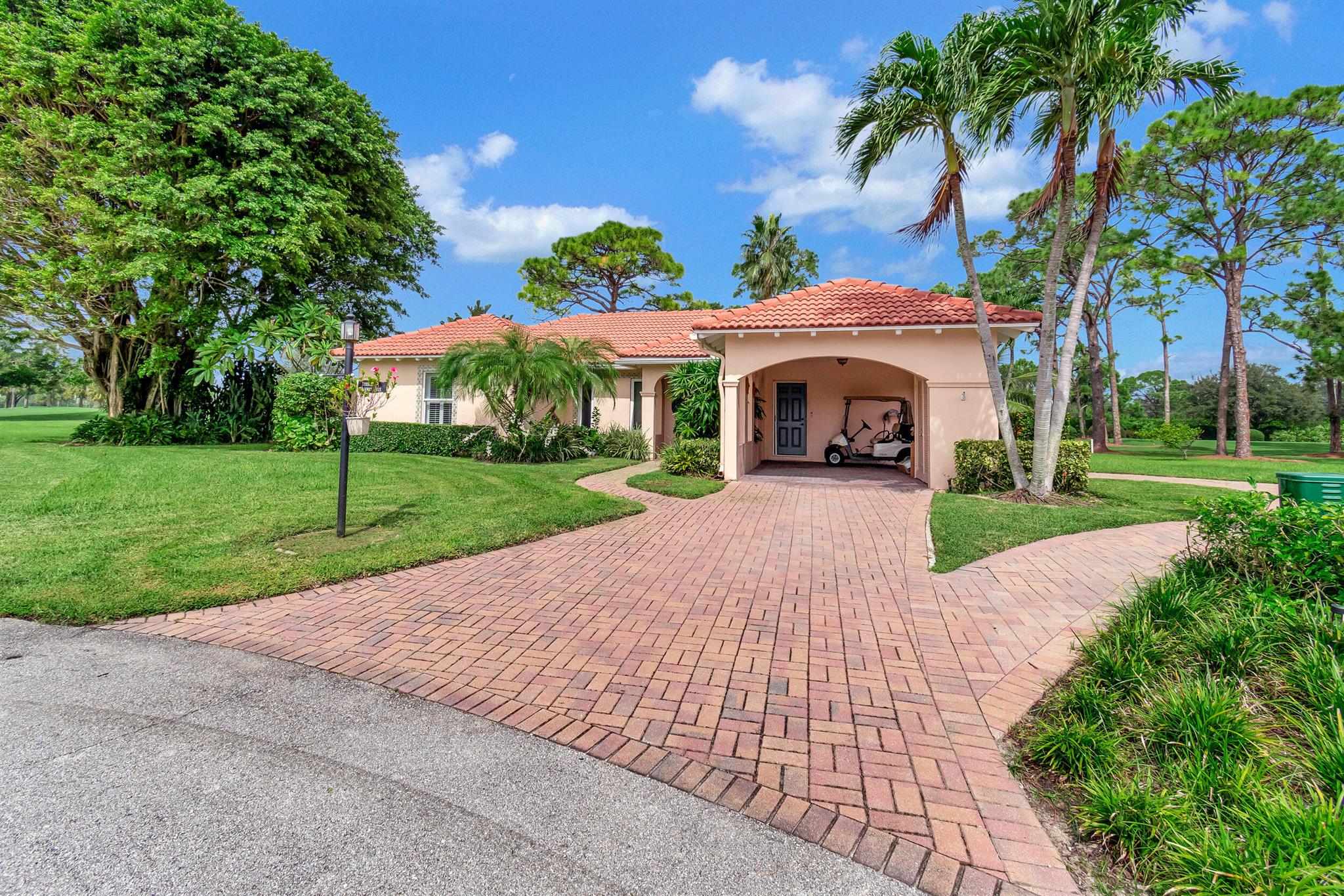 THIS REDONE VILLA IS OVERLOOKING THE 3RD GREEN & 4TH TEE ON THE POINT OF A CUL DE SAC WITH WIDE OPEN GOLF VIEWS. THE HOME HAS WOOD FLOORS, A CUSTOM KITCHEN WITH GRANITE COUNTERS, NEWER BATHROOMS & A FULL HOME GENERATOR & IMPACT GLASS. THERE IS AN OVERSIZED SCREENED PATIO WITH WITH AN AWNING TO TO RELAX IN.