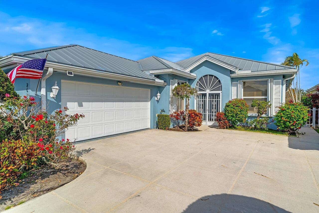 Absolutely Beautiful & stylish LAKEFRONT Divosta built home. Expanded Hampton model with additional 500 square feet makes it one of the largest and functional waterfront homes. Located within the prestigious Meadows at Martin Downs. This 3/2/2 home has a huge family room. Extra-large screened patio overlooking one of the nicest lakefront views. This family friendly community offers manned gated security, large heated/cooled pool, toddler pool, brand new playground, new tennis and pickle ball courts. Near the entrance of the Meadows is a 2,200 square foot recreation center known as the Meadows House.
