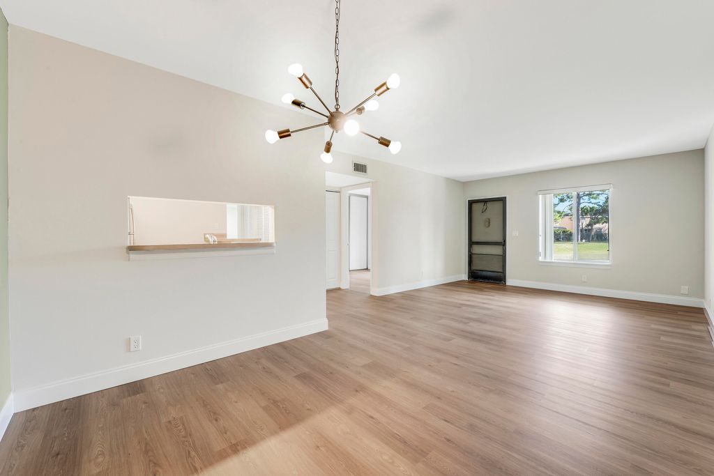 Photo of 6489 Chasewood Drive #D, Jupiter, FL 33458 (MLS # R11166354)