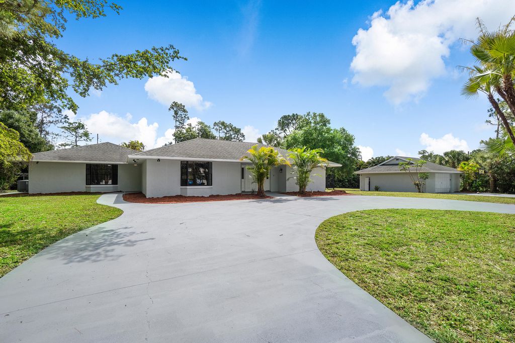 Photo of 15686 84th Avenue N, Palm Beach Gardens, FL 33418 (MLS # R10793281)