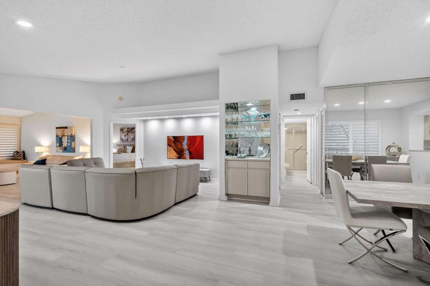 WHAT BETTER WAY TO SPEND NEXT SEASON THAN IN THIS COMPLETELY RENOVATED CONDO WITH SOCIAL AND GOLF MEMBERSHIP. RENTAL TO BEGIN
IN JANUARY. COUNTRY CLUB HAS 2 GOLF COURSES, TENNIS, PICKLEBALL, FITNESS CENTER AND SPA,  8 POOLS, 3 RESTAURANTS, CARD ROOMS AND MUCH MORE. WRAP AROUND PATIO OVERLOOKS, LAKE AND GOLF COURSE, A REAL JEWEL.