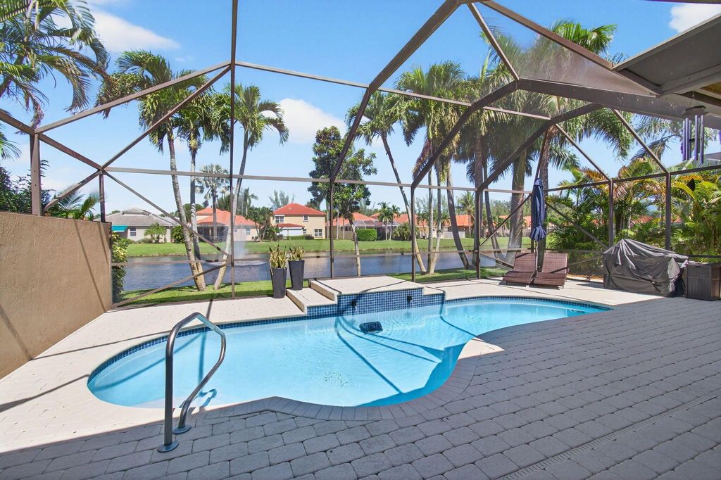 Photo of 4899 Tropical Garden Drive, Boynton Beach, FL 33436 (MLS # R11134920)