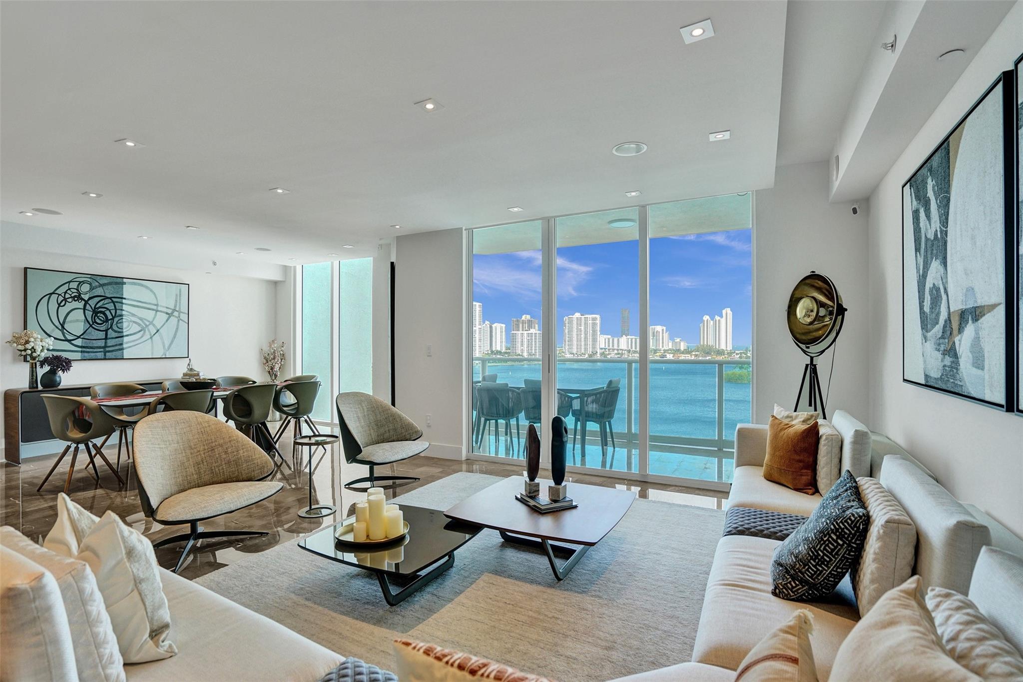 Experience the epitome of luxury living in this beautifully stylish & fully renovated condo, offering breathtaking views of the Ocean, Intracoastal, & City from both East & West facing balconies. W/elegant marble flooring throughout, this expansive 3,524 SF floor plan features a generous great room, formal dining room, open concept kitchen, media room/den, oversized primary bedroom, powder room & laundry area. This condo includes 1 assigned covered parking space & a storage room. Indulge in five-star amenities, including two pools, barbecue areas, two gyms, social lounges, play area, tennis/pickleball courts, 24-hour security, complimentary valet parking, dog park, coffee/deli shop, & much more. Located minutes from Aventura Mall. Also available for rent starting July 15, 2025.