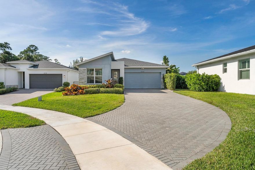 Step into this stunning 3-bedroom, 2-bathroom home with a 2-car garage, where modern design meets comfort. Built in 2021, this property features an open concept layout with high ceilings, creating an inviting and spacious atmosphere. The eat-in kitchen features dark wood cabinets, quartz countertops, a beautiful backsplash, stainless steel appliances, and a generously sized walk-in pantry. The ample-sized primary bedroom is connected to the primary bath featuring double sinks, a well-sized walk-in shower, linen closet, and a large walk-in closet for added convenience. Step outside to the expansive backyard, perfect for entertaining or unwinding. This home is the only one offering direct views of the lake and fountain, providing a peaceful and picturesque backdrop that's truly unique. Don't miss the opportunity to make this exceptional home yours!