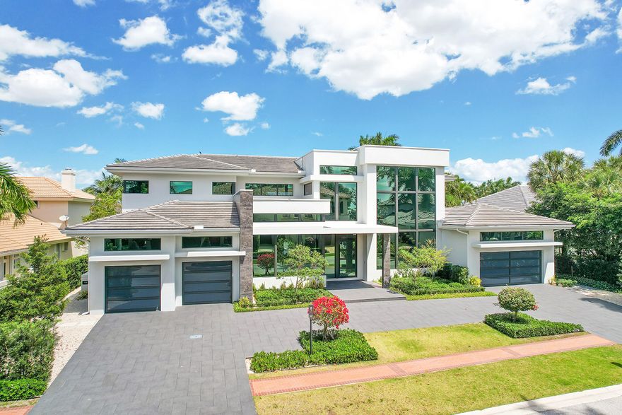 Discover unparalleled luxury in this exquisite home, completed in December 2021 and designed with the utmost sophistication.

The main floor boasts an open floor plan kitchen, family room, and living room as well as an office and a lavish primary bedroom with 2 baths, featuring a shared shower and a luxurious soaking bathtub. A hidden drop-down TV, morning bar, and Tonal exercise machine create a private oasis.

Ascending to the second floor reveals four ensuite bedrooms in two wings, ensuring privacy and convenience. The innovative Trackman Golf Simulator room doubles as a movie theater or a potential sixth bedroom.

This home offers seamless living with both upstairs and downstairs laundry rooms, custom closets throughout, and an elevator for easy accessibility. Enjoy peace of mind with a full house generator, smart home features controlling music, lights, and security, as well as Somfy controlled shades, including blackout and solar options in the primary suite.

Stay connected and secure with indoor and outdoor cameras, while the 5-zone air conditioning system ensures optimal climate control. The property features a 4-car garage and a water vapor remote-controlled fireplace.

Step outside to the Phantom Screen Patio, featuring an outdoor TV and gas fireplace, offering a perfect blend of indoor-outdoor living. Relax in the saltwater pool and spa, complemented by a soothing waterwall, or entertain guests in the summer kitchen equipped with a refrigerator, icemaker, and grill.

Marvel at the panoramic views overlooking Championship Hole 8, enhancing your outdoor experience. With a total of 9613 square feet, including 7809 square feet under air, this home provides ample space for luxurious living.

All furniture and TVs are available, making this home move-in ready for those seeking the pinnacle of elegance and convenience. Seize this opportunity to own a residence where every detail is meticulously crafted for a life of unparalleled comfort and style.